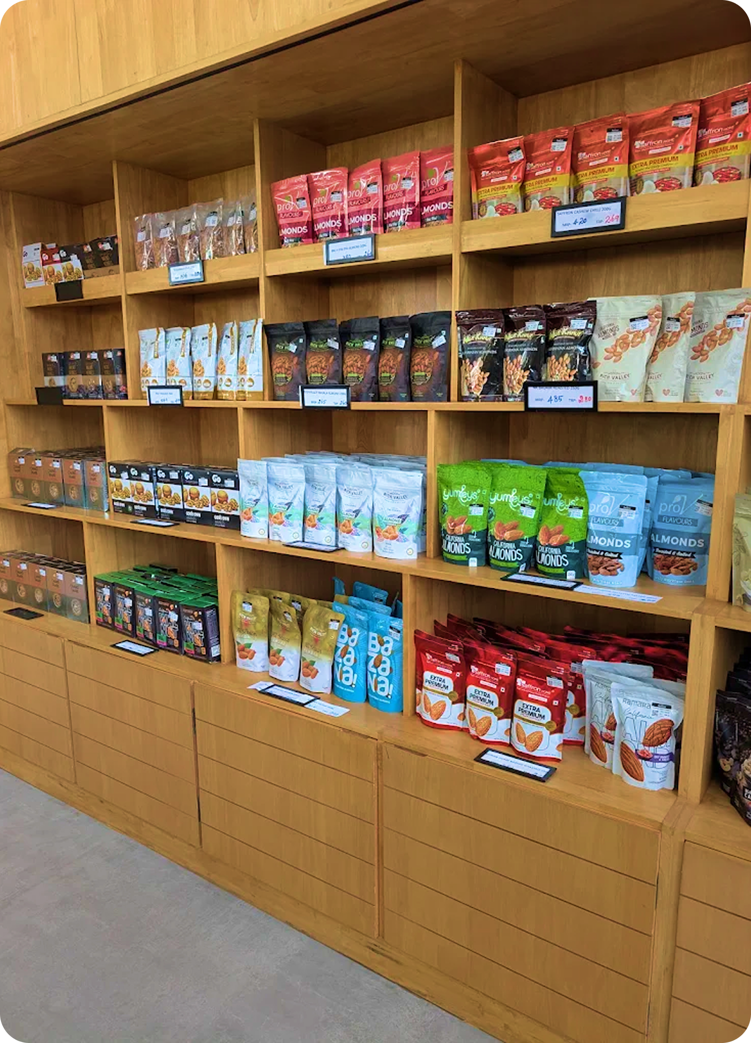 Wooden retail shelves stocked with Thamarai pouches