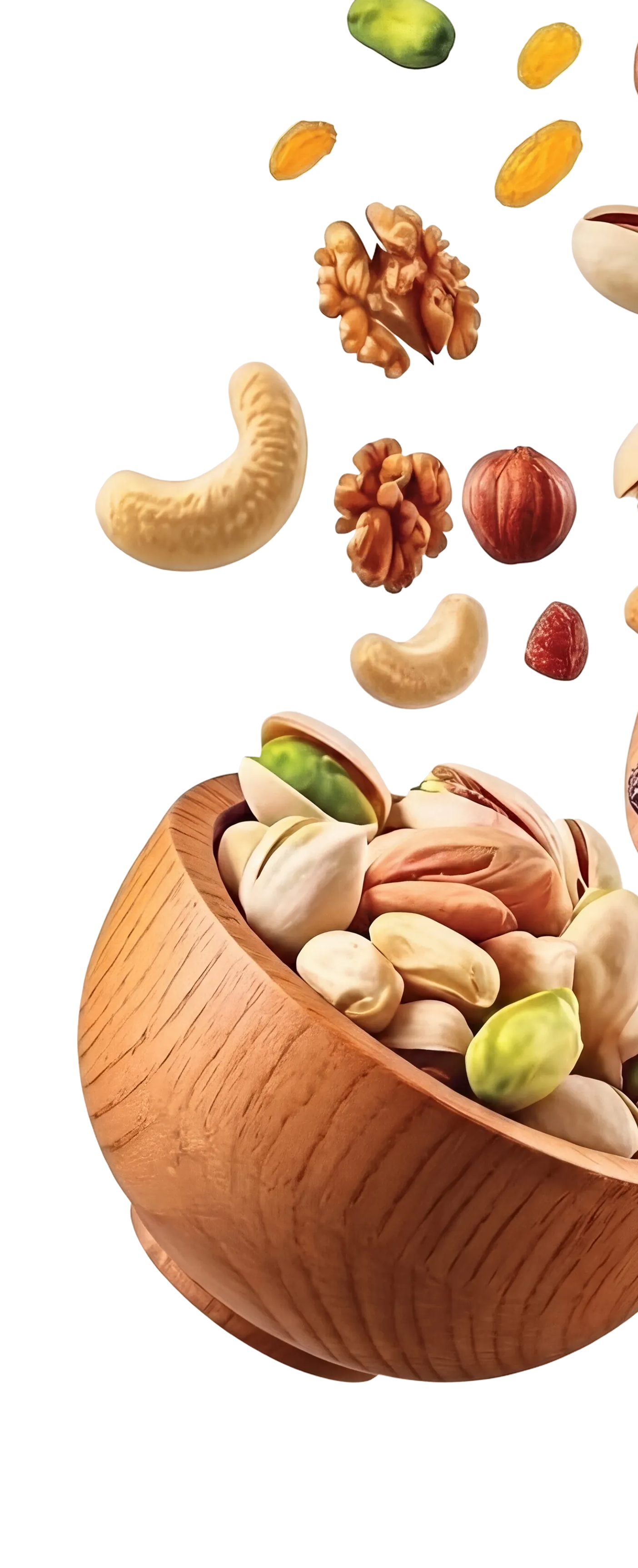 Wooden bowl of pistachios with nuts falling around it